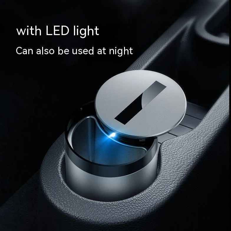 Silver intelligent induction ashtray with automatic lid on a car centre console