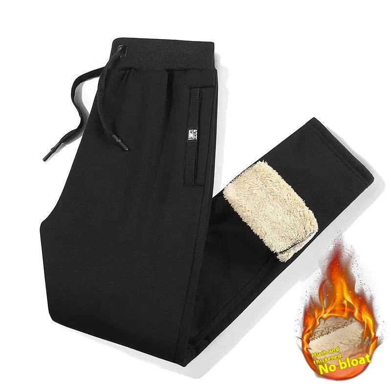 Men's gray fleece-lined oversized track pants with cotton fabric and drawstring waist