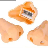 Flesh coloured plastic pencil sharpener with big nostril design for manual pencil sharpening