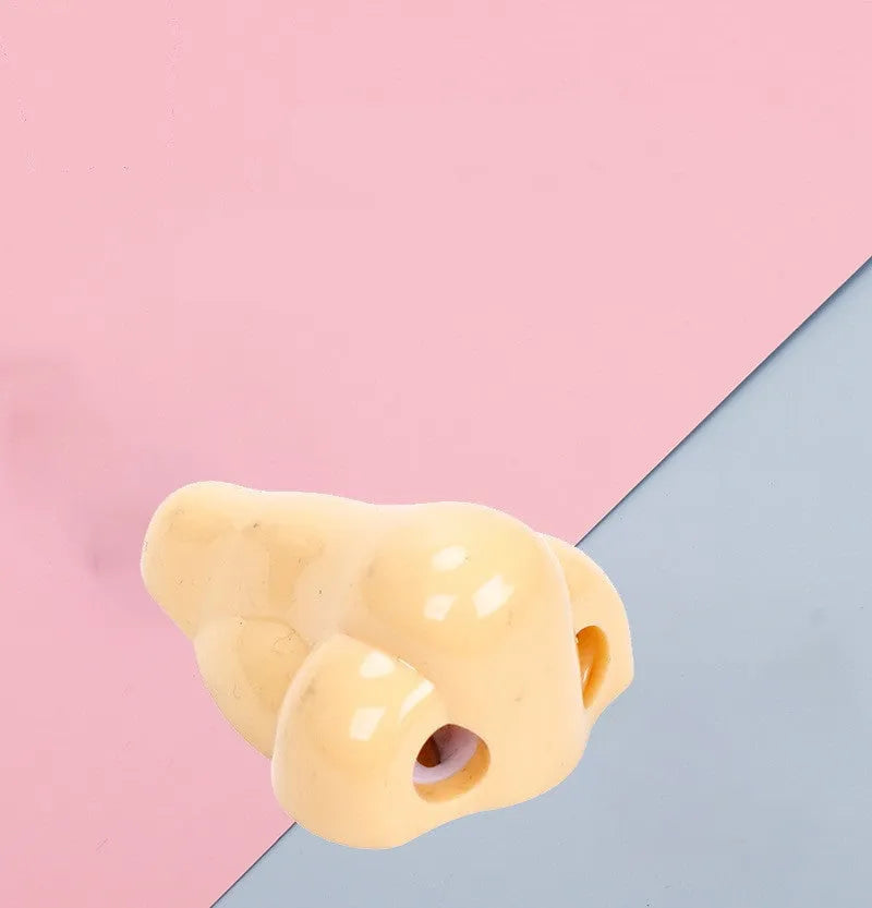 Flesh coloured plastic pencil sharpener with big nostril design for manual pencil sharpening