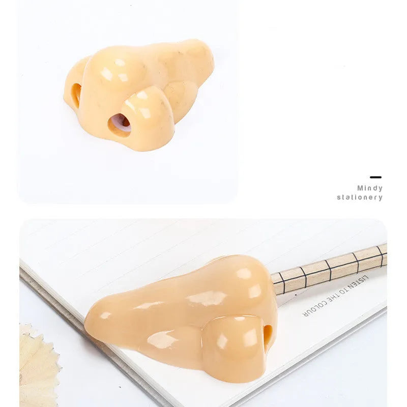 Flesh coloured plastic pencil sharpener with big nostril design for manual pencil sharpening