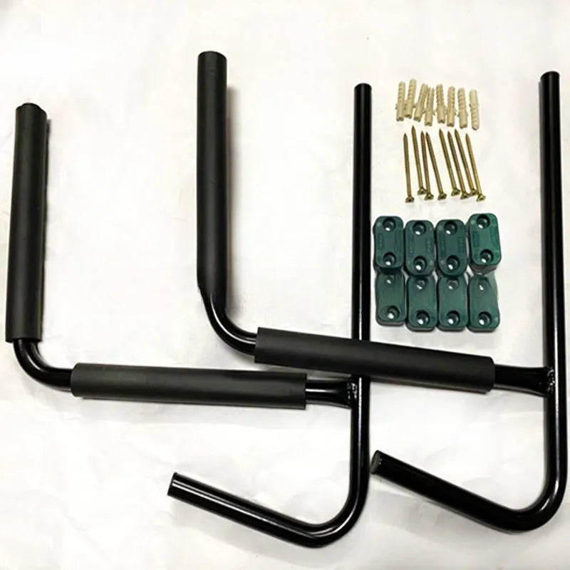 Carbon steel kayak wall hanger with foam-lined hooks mounted on a wall, showing dimensions of 43 by 38 cm.
