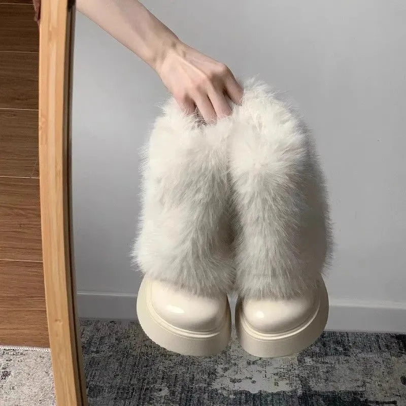 Women's black artificial plush snow boots with a low-top design and a waterproof rubber platform sole.