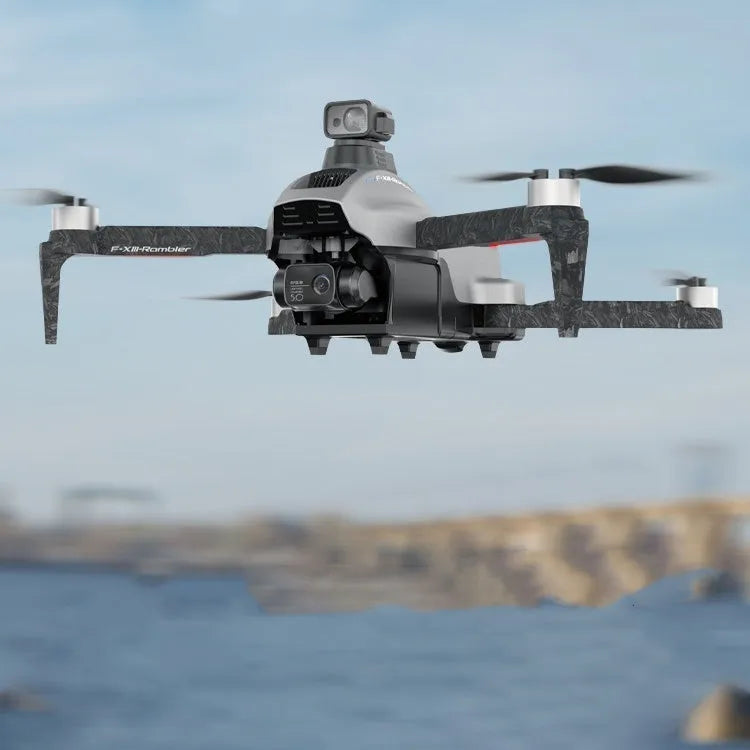 White folding quadcopter drone with 4K camera and obstacle avoidance sensors on a grassy field.