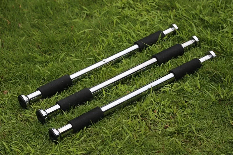 Steel adjustable pull-up bar extended to fit in a home door frame.