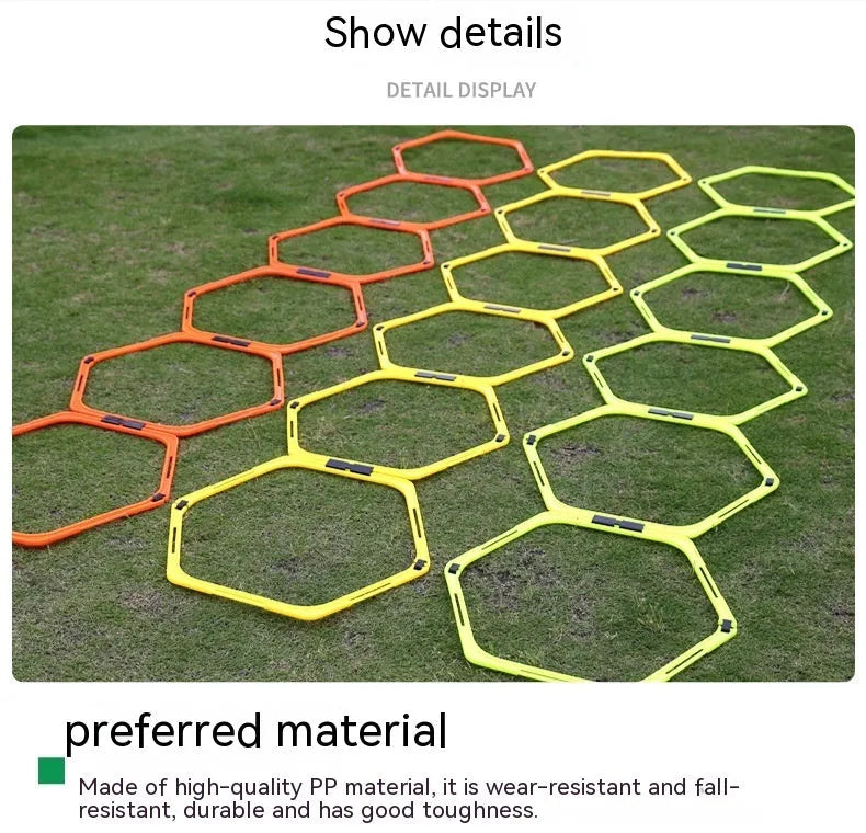 Set of six foldable yellow, green, and orange hexagon football agility training rings on grass