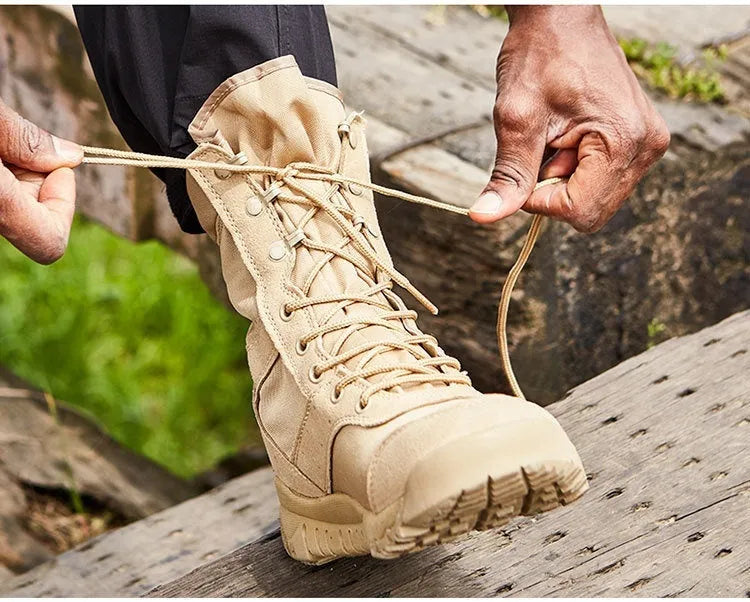 Yulong summer tactical desert combat boots in black and sand colour, shown on a rocky outdoor surface.
