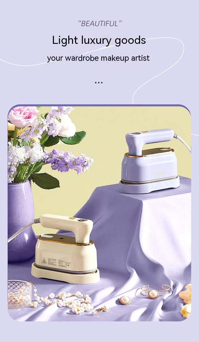 Light purple foldable portable travel iron with a ceramic soleplate and UK plug on a white background.