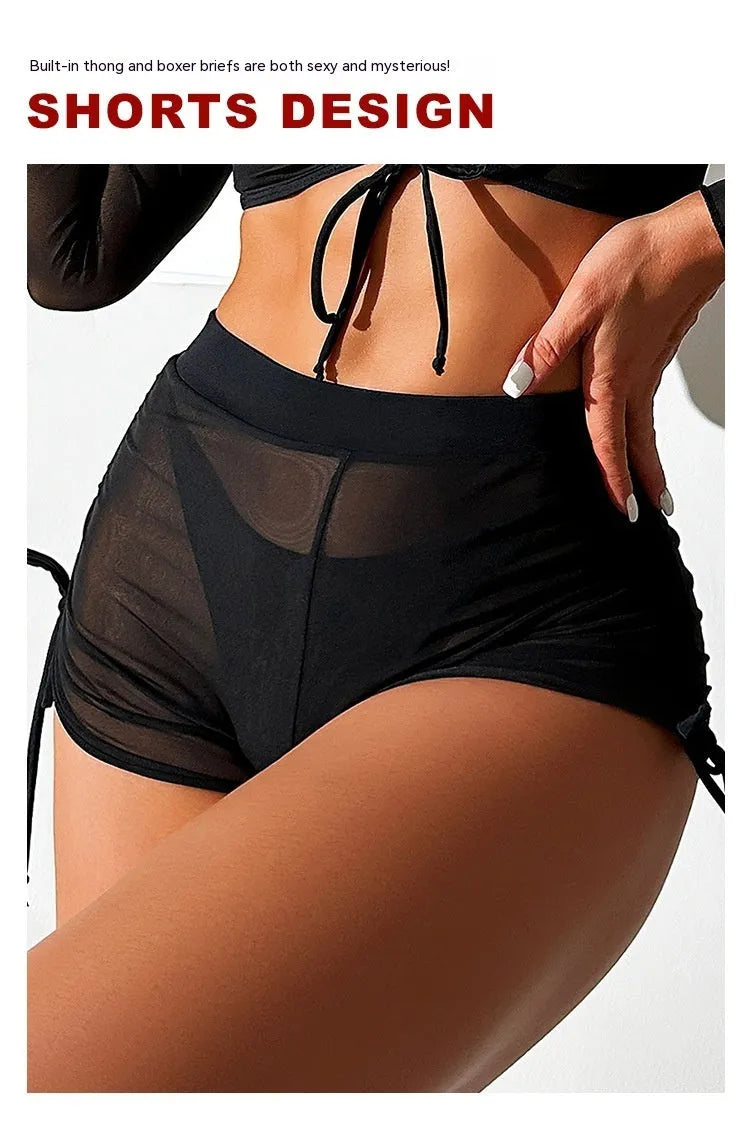 Black long sleeve mesh top and briefs from a women's four-piece bikini swimwear set.