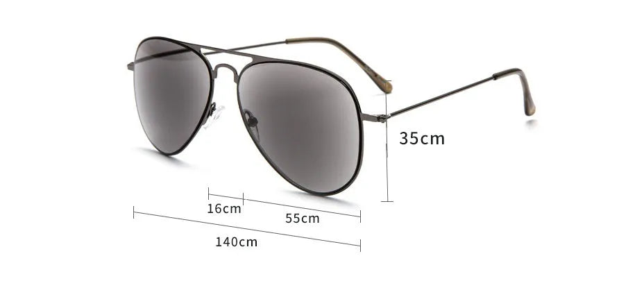 Full lens sun reading glasses with black stainless steel frame resting on a table