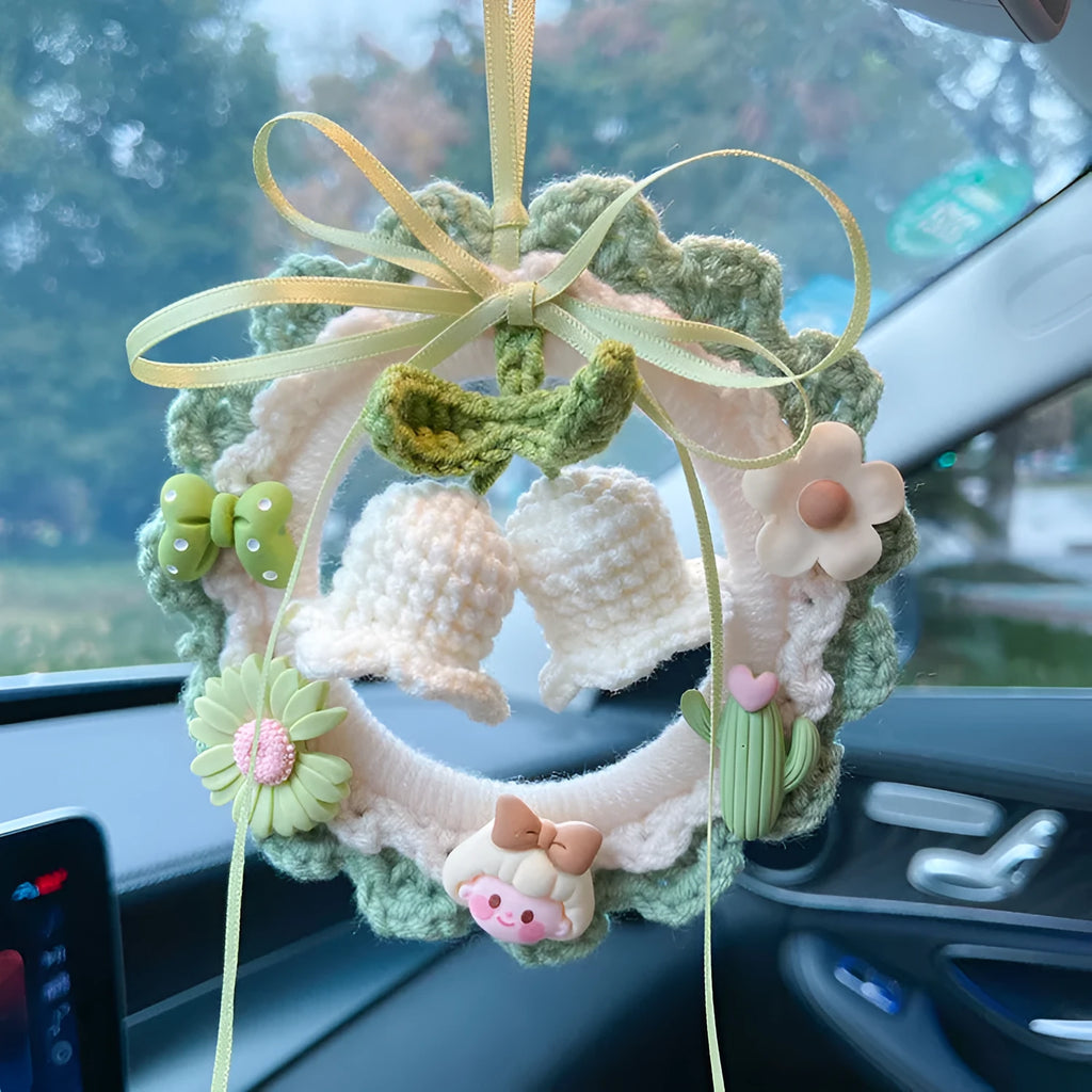 Handwoven wool bell orchid car pendant in green, available with an attached dream catcher.