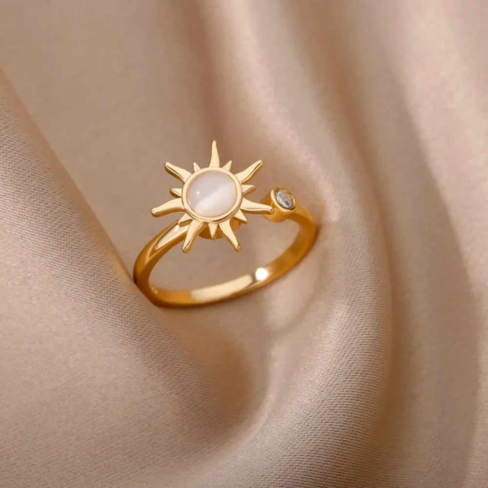 Gold electroplated copper rotatable decompression ring with geometric design and adjustable opening