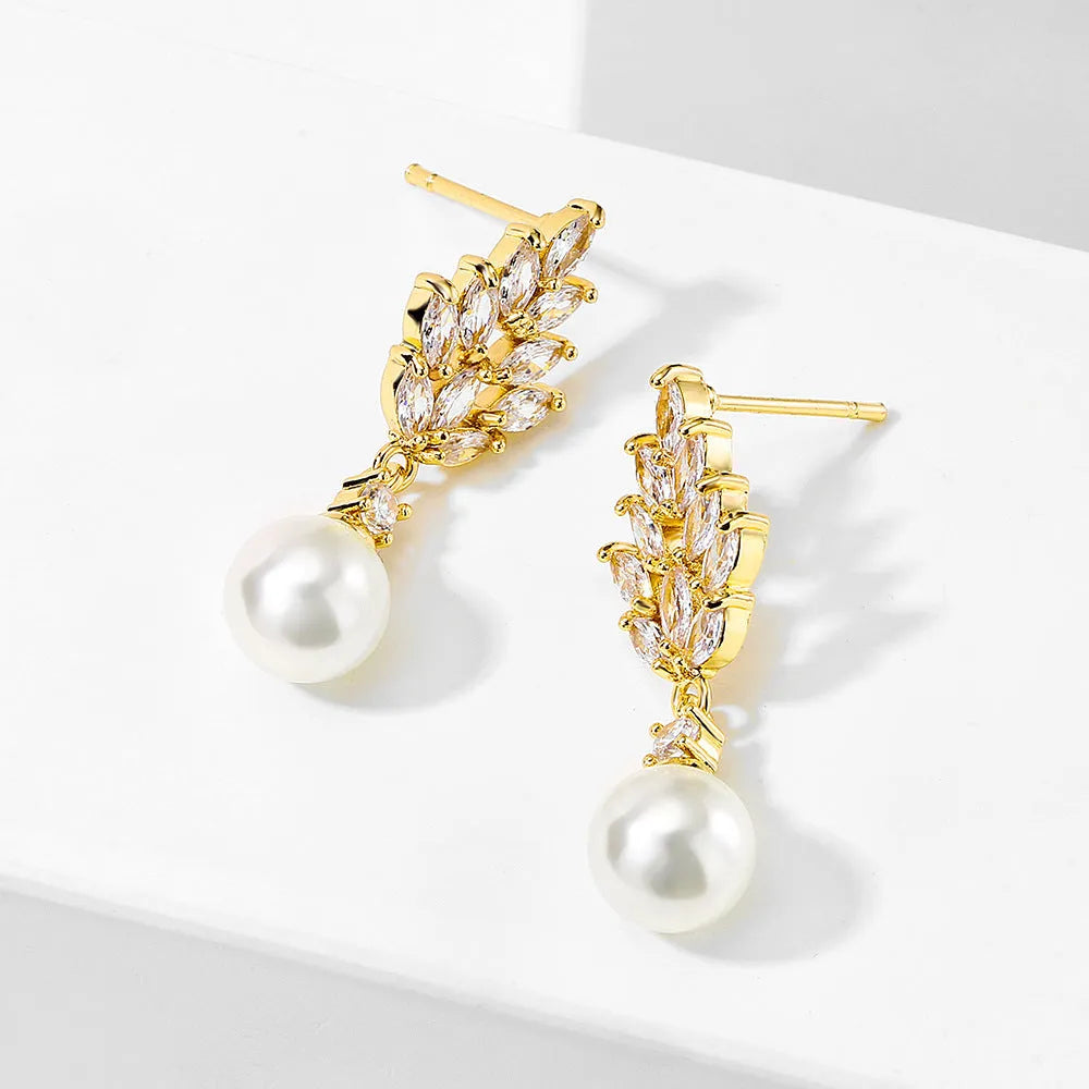 Geometric floral design earrings with micro inlaid zircon detail in gold, platinum, or rose gold plating.