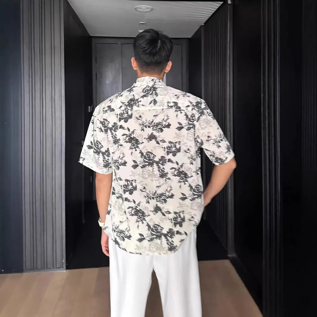 Black and white floral printed short sleeve shirt with loose fit cardigan style