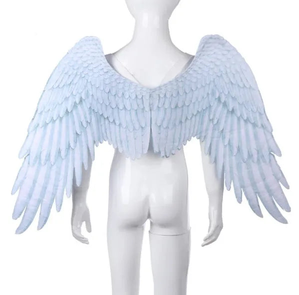 White 3D angel wings costume accessory made from non-woven fabric on child, 33cm by 68cm by 54cm
