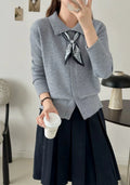 Beige lapel scarf collar cardigan sweater with long sleeves on a hanger