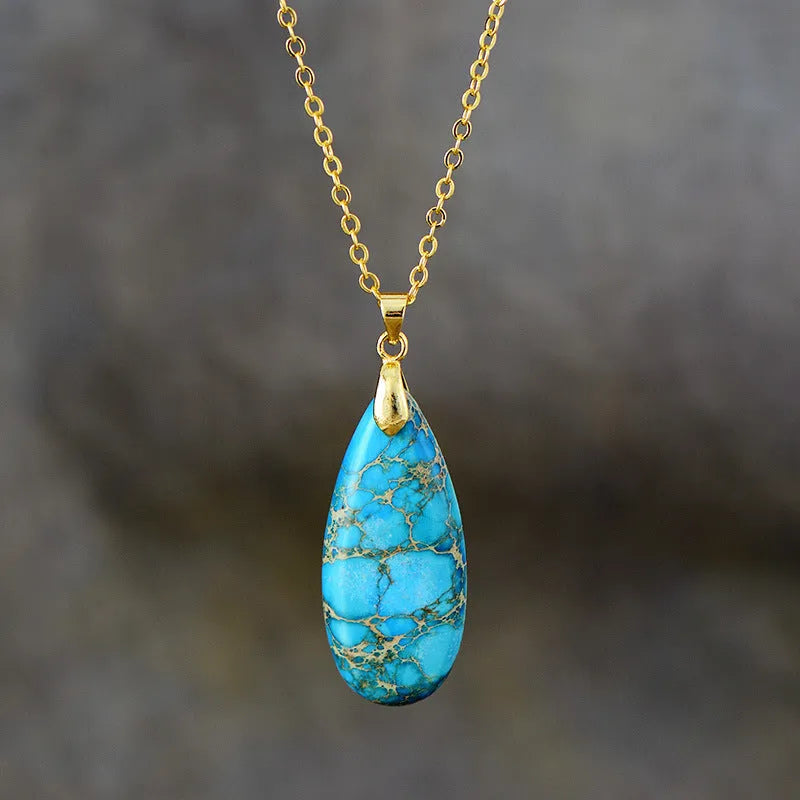 Emperor Stone jade pendant necklace with 18K gold plating, showing heart-shaped design in red silver finish.