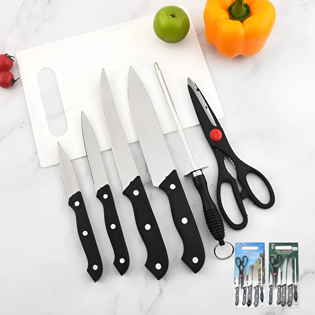 Stainless steel knife with 17.5cm blade and black A-style cutting board on kitchen countertop
