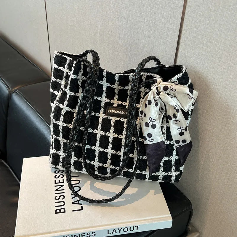 Black wool blend horizontal square shoulder bag with internal compartments for commuting and shopping