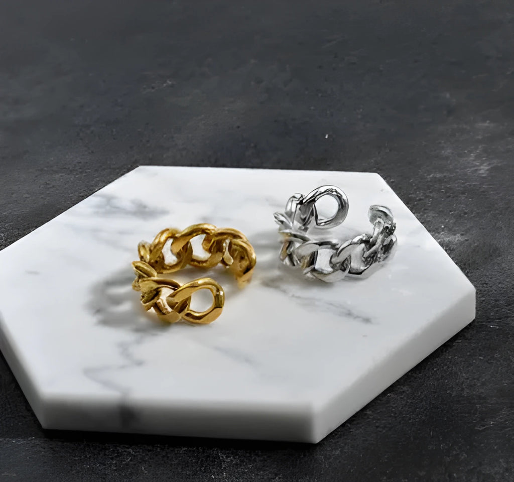Golden aluminium alloy adjustable geometric ring chain on white background