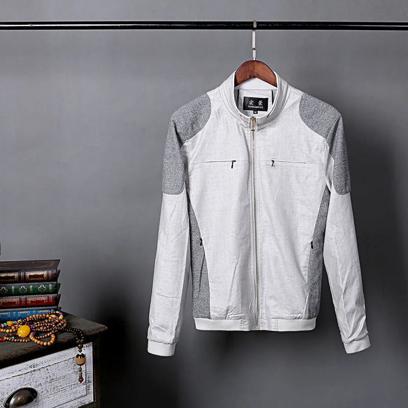 Men's thin blue cotton linen jacket on a hanger, showing regular cut and front button design.