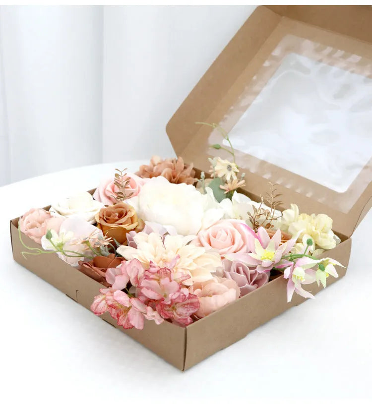 Silk flower bouquet in Lotus Pink Champagne Rose gift box with half-handmade arrangement on white background.