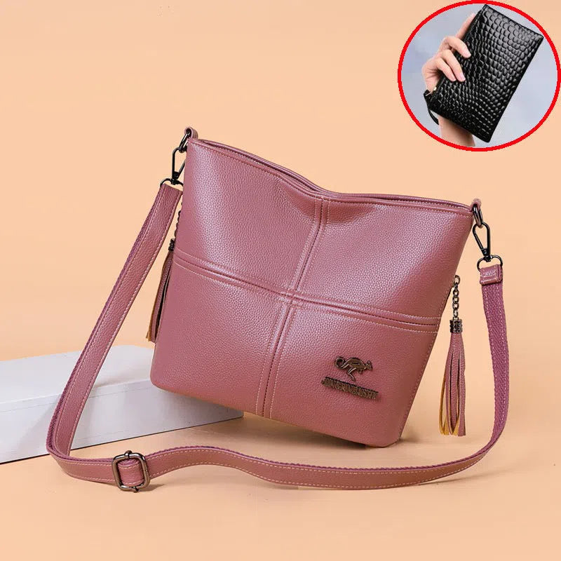 PU soft-leather-texture crossbody bag in red with stitching and tassels, horizontal shape, large capacity