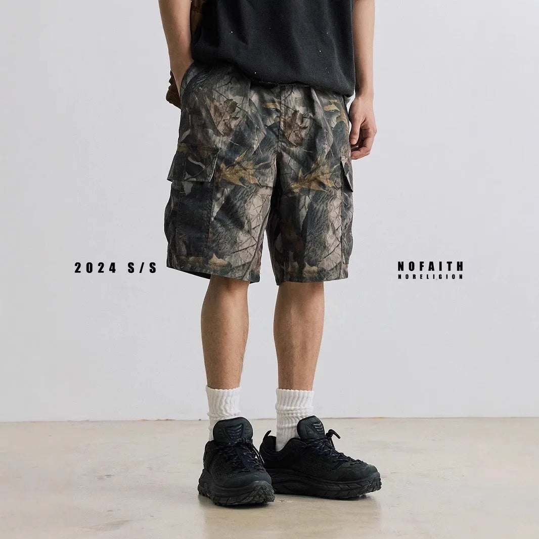 Loose straight-leg casual denim shorts in black or army green with a mid waist and zip fly.