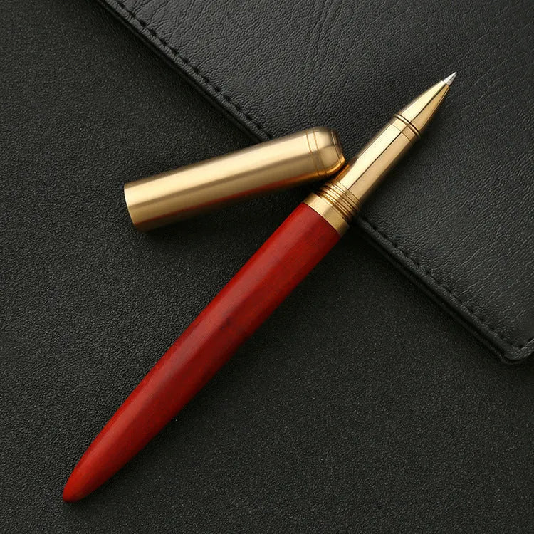 Brass sandalwood signature pen 14cm solid wood metal barrel ballpoint on white background