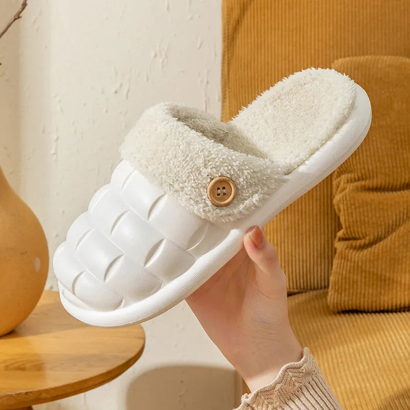 Plaid patterned EVA detachable slippers with plush lining, shown in pink, on a plain background.