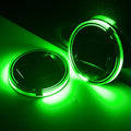 Solar-powered LED cup mat in blue, 7.2cm diameter, with solar panel on a windowsill