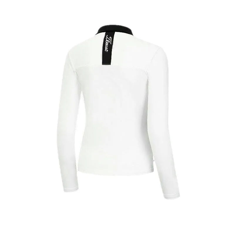 Women's white long sleeve golf top with slim sports styling for outdoor sun protection