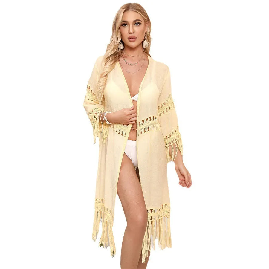 Hand crocheted women's beach cover-up cardigan with tassel stitching in solid colour