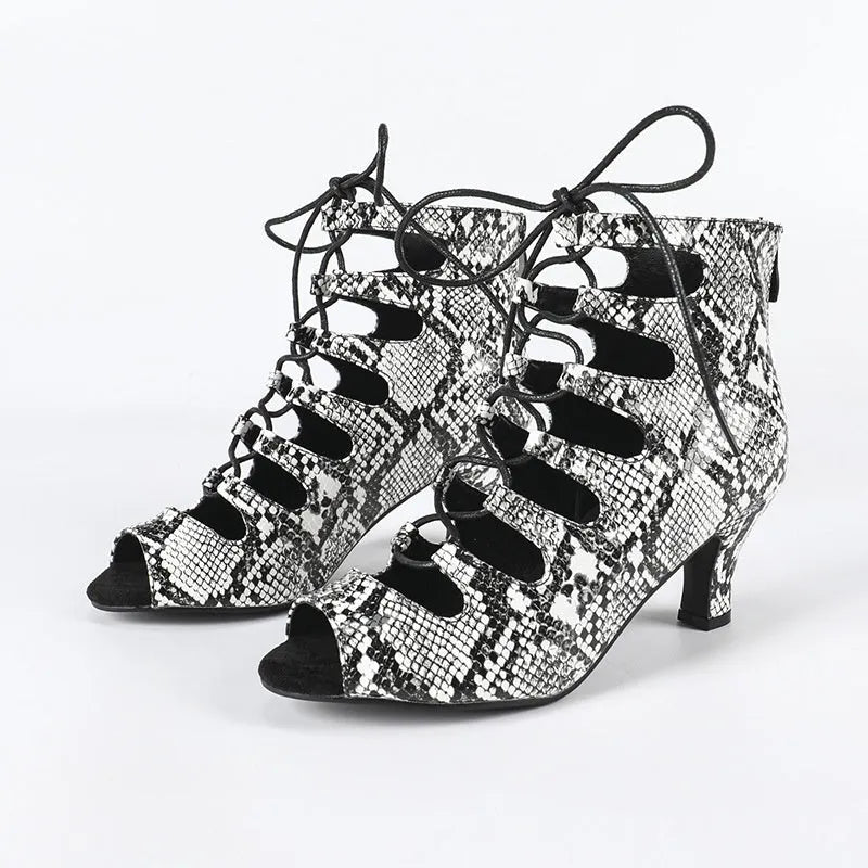 Women's lace-up Latin dance shoes in black with synthetic leather upper and leather sole, side view