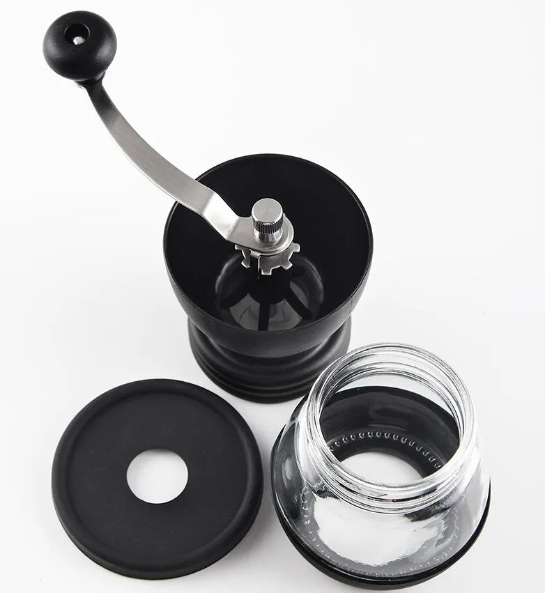 Hand grinder coffee machine with beech wood body and black finish on a countertop, width 88mm