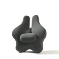 Memory foam car lumbar support cushion in solid colour on a car seat.