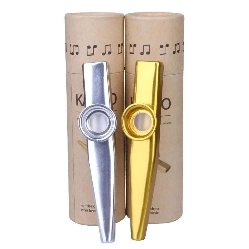 Metal kazoo in Flame Red with paper tube against a white background