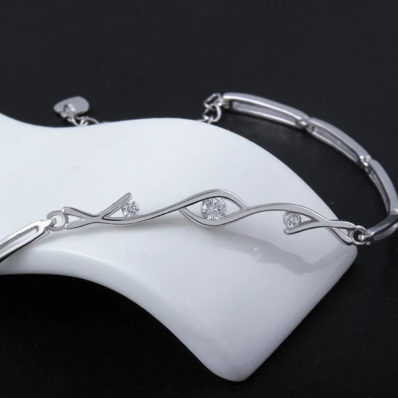 Crystal zircon pendant necklace on 925 sterling silver chain with white gold electroplate finish and clear faceted stone