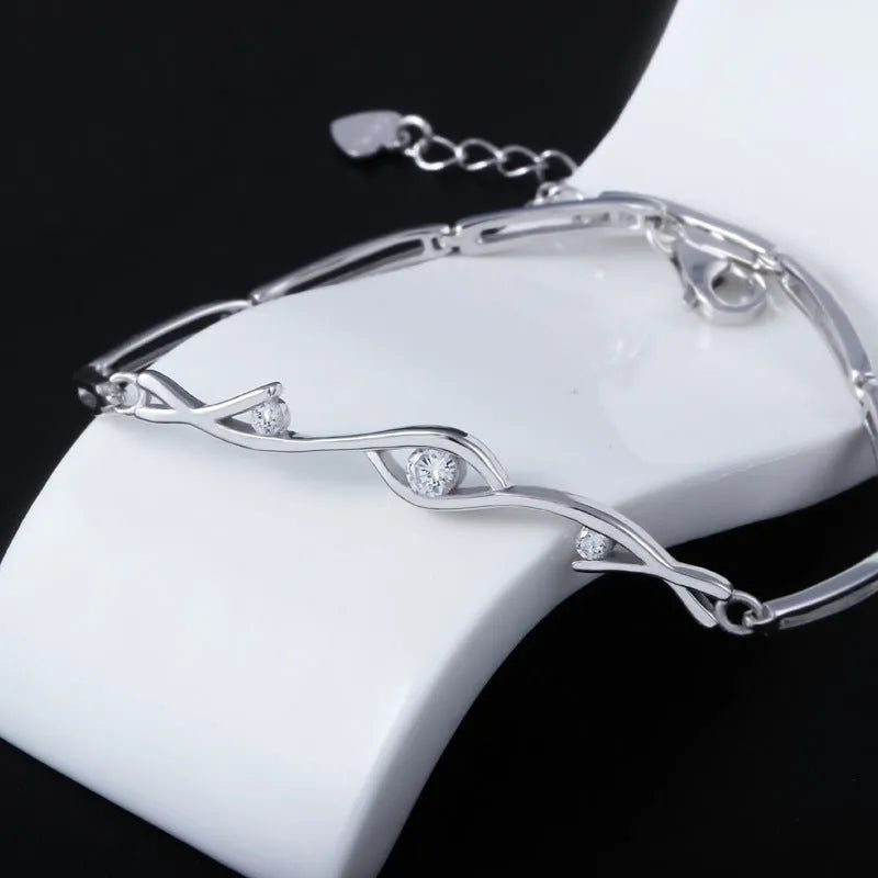 Crystal zircon pendant necklace on 925 sterling silver chain with white gold electroplate finish and clear faceted stone