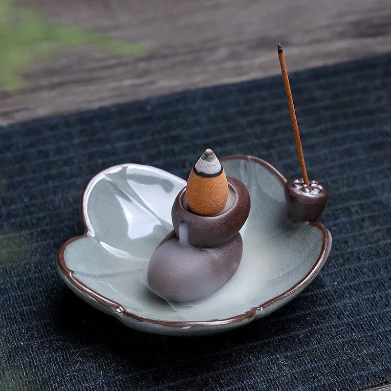 Square purple clay ceramic incense burner with reverse flow design and lotus decoration