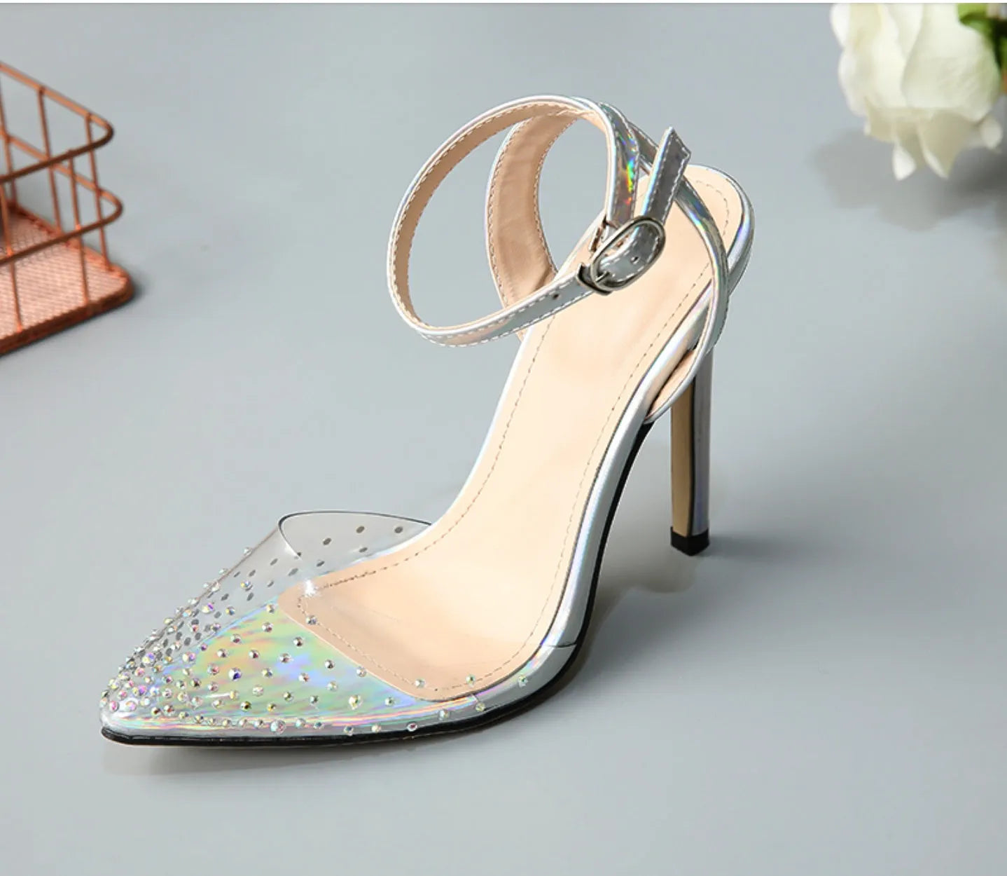 Women's pointed toe diamond sandals with a stiletto heel and PVC upper, shown in available sizes.