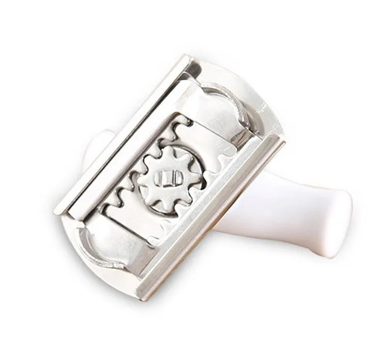 White stainless steel manual adjustable bottle opener with gear design on a table