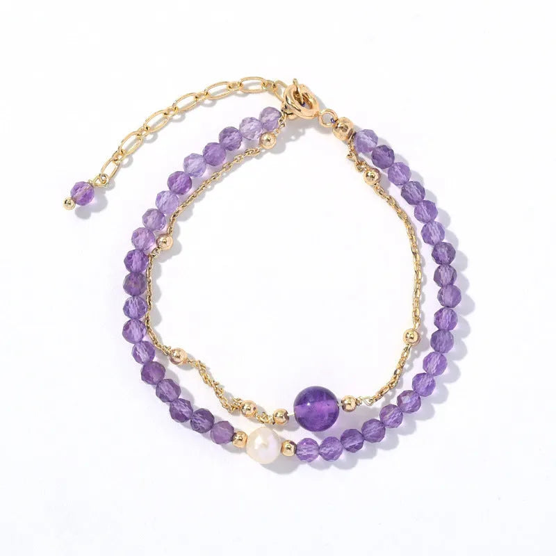 Women's amethyst bracelet with electroplated crystal stones in a diamond Chinese pattern.