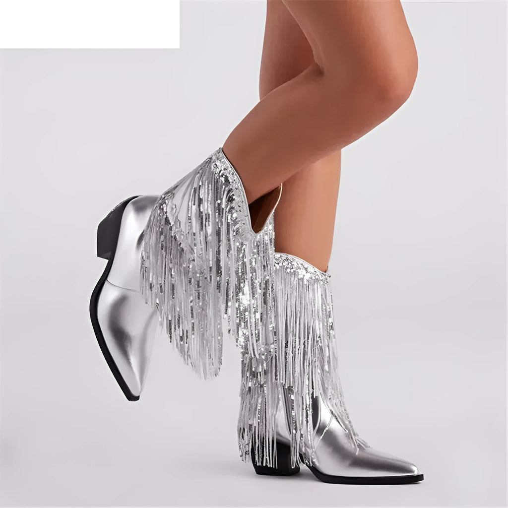 Women's black chunky heel ankle boots with tassel detail and a high stiletto heel on a white background.