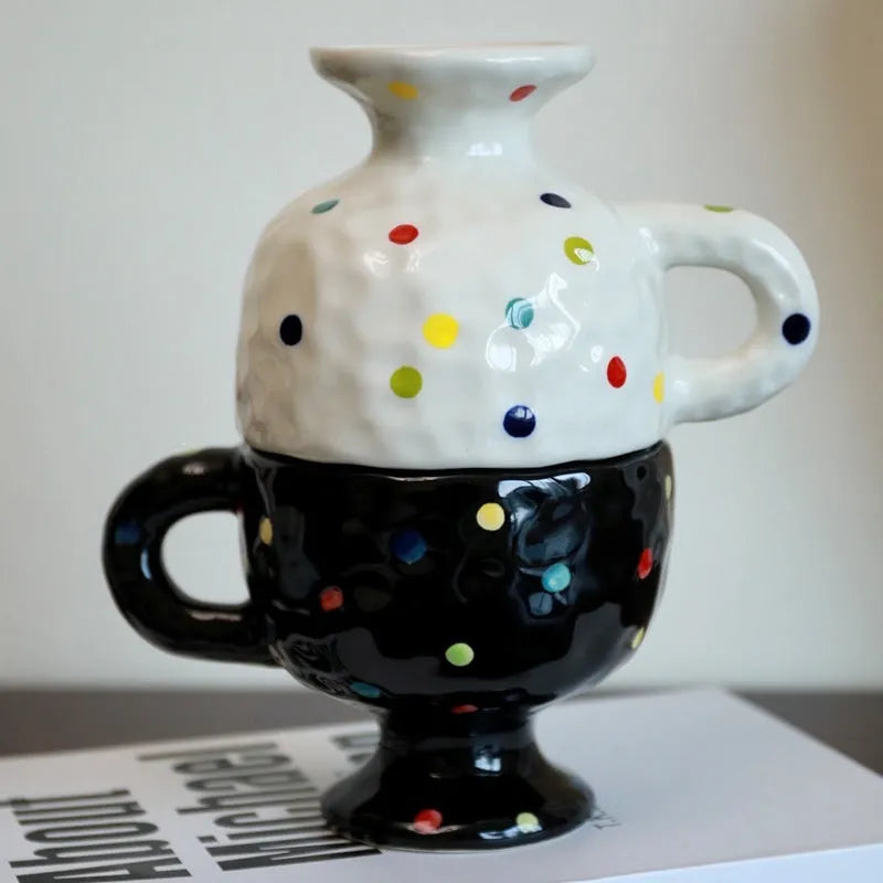 Hand-pinched irregular ceramic mug in a solid colour, shown from the side.
