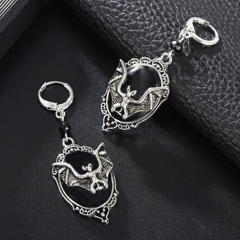 Black alloy Halloween bat earrings with electroplated finish and inlaid gems, unisex style