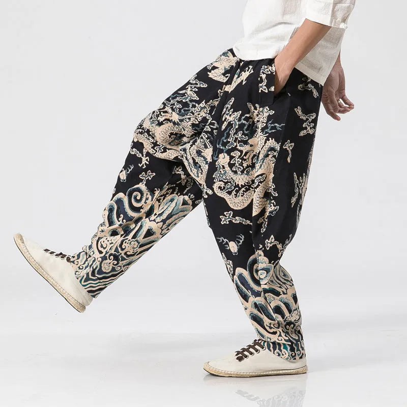 Men's dragon print cross harem trousers with elastic waist and loose leg