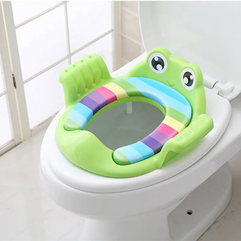 Pink baby toilet seat with adjustable non-slip pads for toddlers aged 1-6 years on a toilet bowl