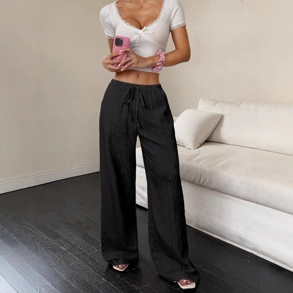 Women's wide leg trousers with lace-up waist trimming detail in polyester fabric