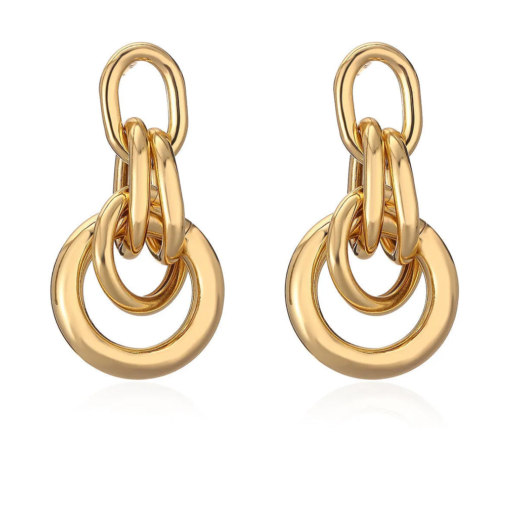 Women's geometric copper earrings with gold colour finish and irregular shapes